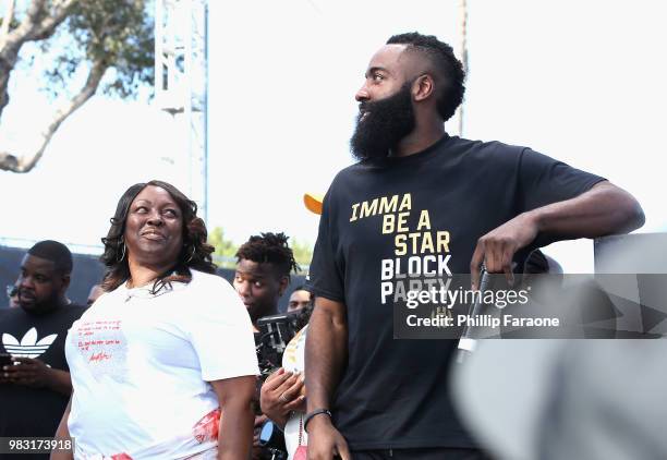 James Harden and Monja Willis onstage at "Imma Be a Star" Block Party at Audubon Middle School on June 24, 2018 in Los Angeles, California.