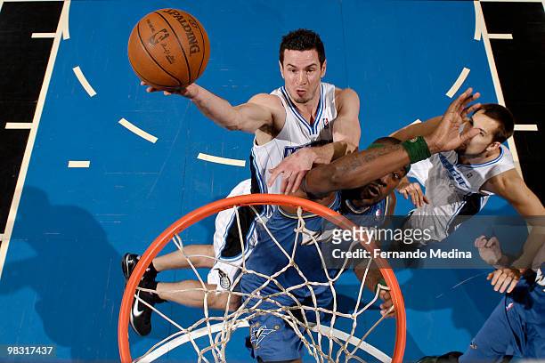 Redick of the Orlando Magic takes the ball to the basket against Andray Blatche of the Washington Wizards during the game on April 7, 2010 at Amway...