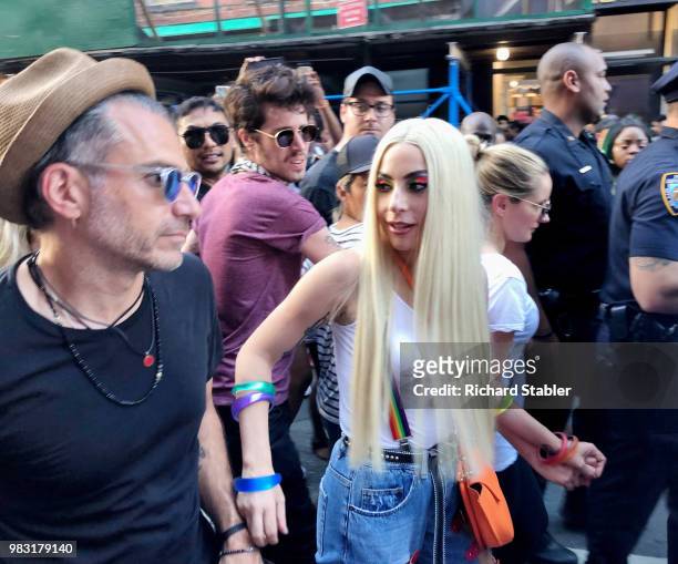 Lady Gaga and Christian Carino are seen at the 2018 New York City Pride March on June 24, 2018 in New York City.
