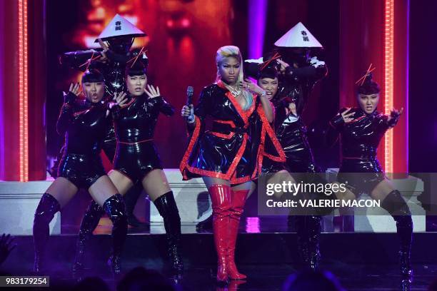 Trinidadian rapper Nicki Minaj performs onstage during the BET Awards at Microsoft Theatre in Los Angeles, California, on June 24, 2018.