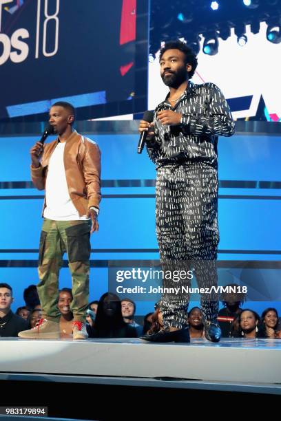 Host Jamie Foxx and Donald Glover speak onstage at the 2018 BET Awards at Microsoft Theater on June 24, 2018 in Los Angeles, California.