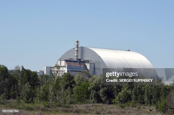 Picture shows a general view of Chernobyl's New 108 metres Safe confinement covering the 4th block of Chernobyl nuclear power plant on June 8, 2018....