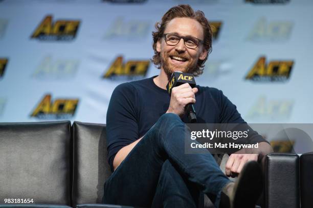 Actor Tom Hiddleston speaks on stage about life as Loki in the Marvel Universe during ACE Comic Con at WaMu Theatre on June 24, 2018 in Seattle,...