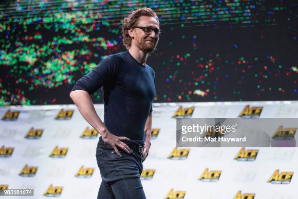 Tom Hiddleston reacts to Tom Holland admitting he can't actually do everything Spider-Man can do while on stage during ACE Comic Con at WaMu Theatre...