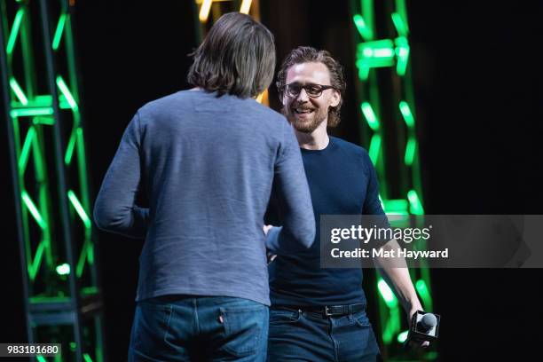 Actor Tom Hiddleston speaks on stage about life as Loki in the Marvel Universe during ACE Comic Con at WaMu Theatre on June 24, 2018 in Seattle,...