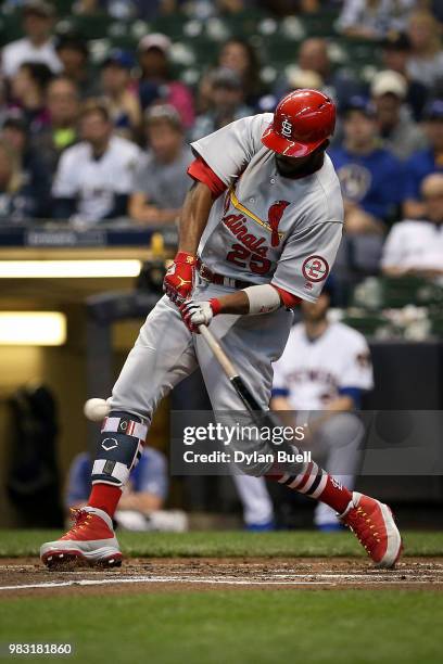 Dexter Fowler of the St. Louis Cardinals lines out in the second inning against the Milwaukee Brewers at Miller Park on June 22, 2018 in Milwaukee,...