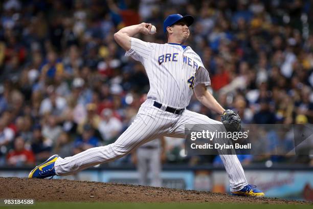 Corey Knebel of the Milwaukee Brewers pitches in the ninth inning against the St. Louis Cardinals at Miller Park on June 22, 2018 in Milwaukee,...