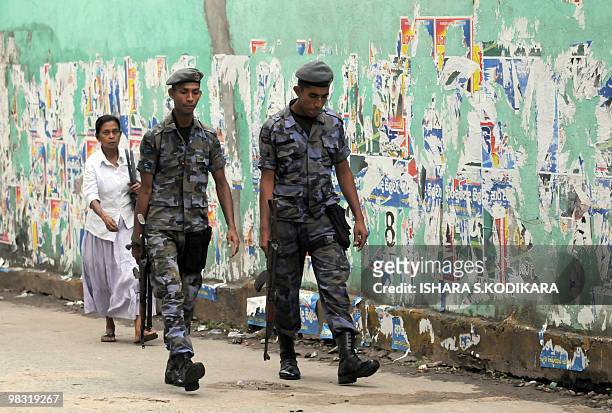 Sri Lankan special forces commandos patrol near a polling station in Colombo on April 8, 2010. Sri Lankans are voting in a parliamentary poll that is...