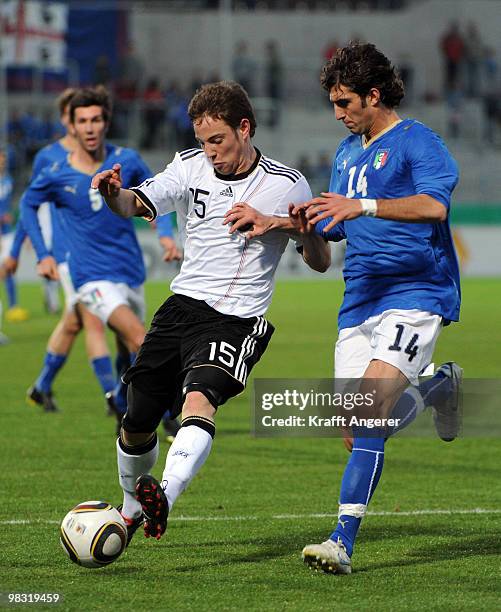 Fabian Baecker of Germany challenges for the ball with Luca Ricci of Italy during the U20 international friendly match between Germany and Italy at...