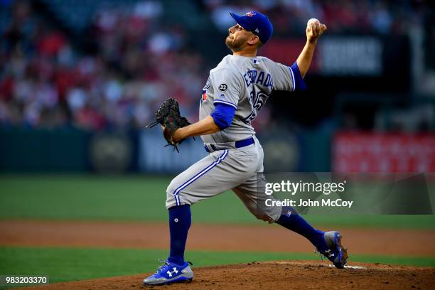 Marco Estrada of the Toronto Blue Jays pitches against the Los Angeles Angels of Anaheim in the first inning at Angel Stadium on June 22, 2018 in...