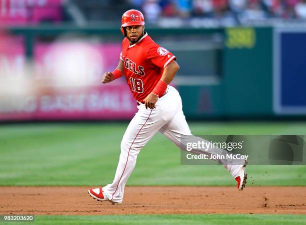 Luis Valbuena of the Los Angeles Angels of Anaheim runs to third base in the first inning against the Toronto Blue Jays at Angel Stadium on June 22,...