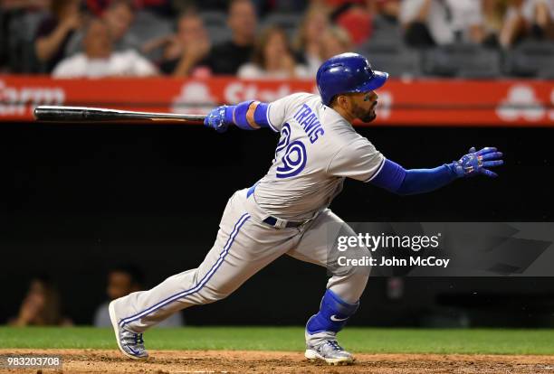 Devon Travis of the Toronto Blue Jays ground out against the Los Angeles Angels of Anaheim in the fifth inning at Angel Stadium on June 22, 2018 in...