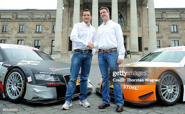 Timo Scheider and Ralf Schumacher pose during the DTM German Touring Car press conference at the Kurhaus on April 8, 2010 in Wiesbaden, Germany.