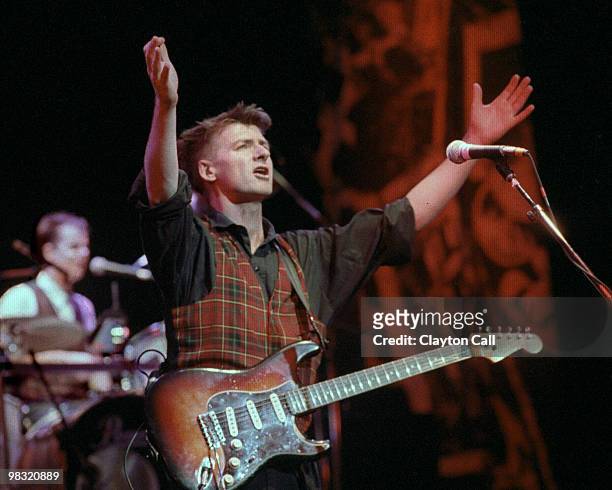 Neil Finn playing fender stratocaster guitar with Crowded House at the Warfield Theater in San Francisco on April 05 1989