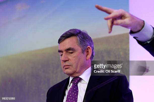 British Prime Minister Gordon Brown waits to speak during the Labour party's first press conference of the election campaign in Westminster on April...
