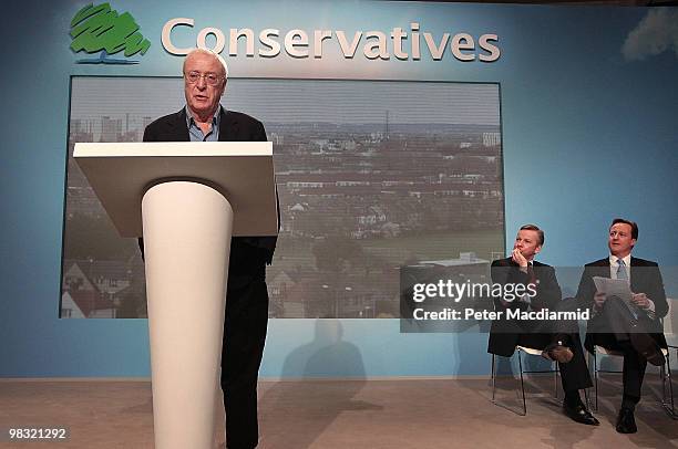 Actor Sir Michael Caine helps launch a 'National Citizens Service' watched by Conservative party leader David Cameron and shadow education spokeman...