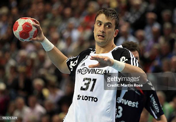 Momir Ilic of Kiel throws the ball during the Toyota Handball Bundesliga match between THW Kiel and SG Flensburg-Handewitt at the Sparkassen Arena on...