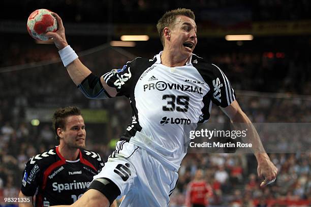 Filip Jicha of Kiel throws the ball during the Toyota Handball Bundesliga match between THW Kiel and SG Flensburg-Handewitt at the Sparkassen Arena...