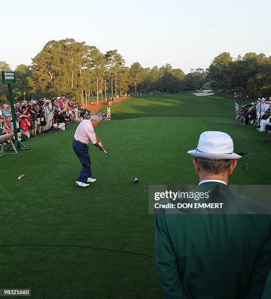 Golfer Arnold Palmer tees off in the ceremonial opening of the Masters golf tournament at Augusta National Golf Club on April 8, 2010 in Augusta,...