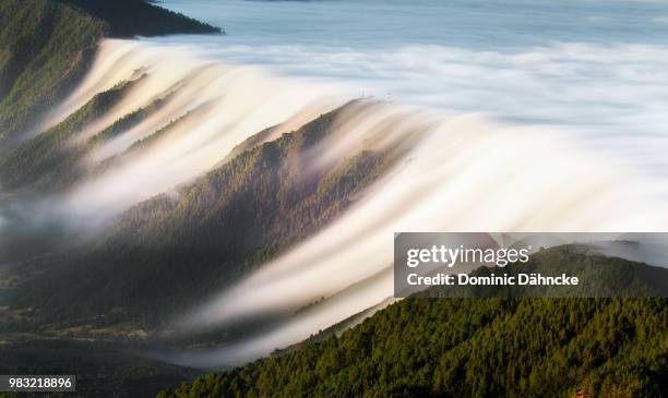 waterfall of clouds (la palma island. canary islands) - wind stockfoto's en -beelden