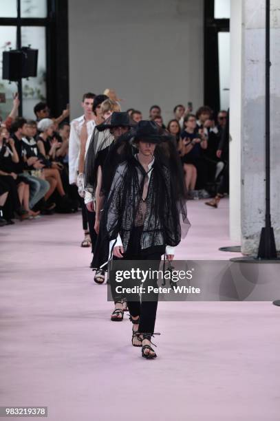 Models walk the runway during the Ann Demeulemeester Menswear Spring/Summer 2019 show as part of Paris Fashion Week on June 22, 2018 in Paris, France.