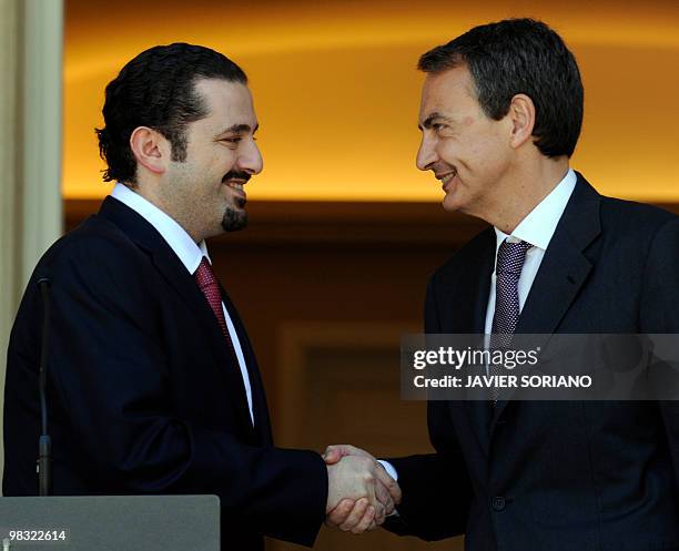 Spain's Prime Minister Jose Luis Rodriguez Zapatero shakesw hand with Lebanon's counterpart Saad Hariri after a meeting at Moncloa Palace in Madrid,...