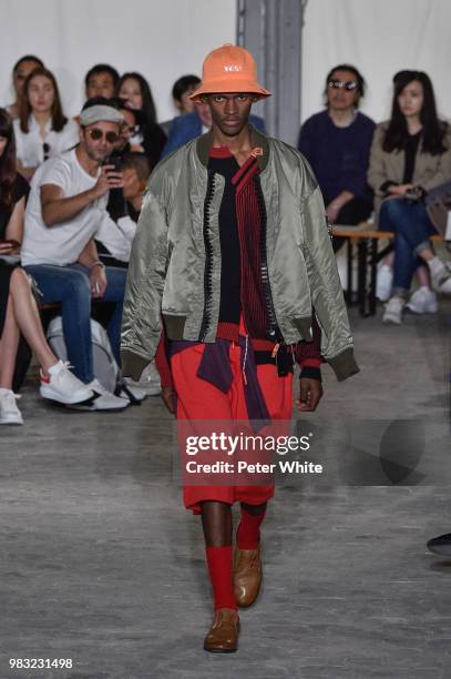 Model walks the runway during the Maison Mihara Yasuhiro Menswear Spring/Summer 2019 show as part of Paris Fashion Week on June 22, 2018 in Paris,...