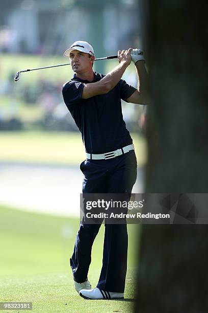 Dustin Johnson hits his approach shot on the first hole during the first round of the 2010 Masters Tournament at Augusta National Golf Club on April...