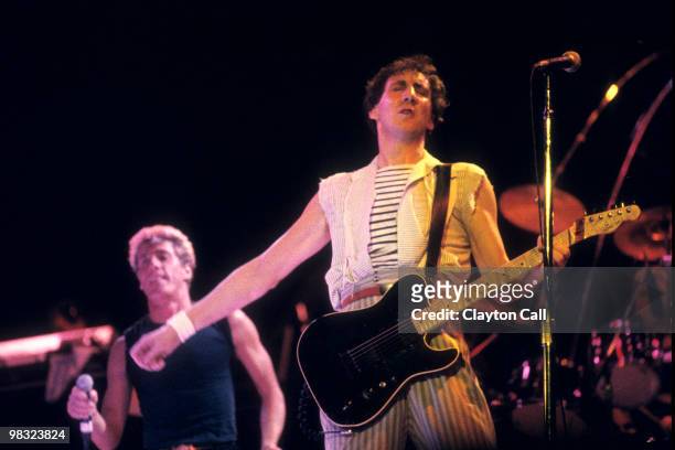 Roger Daltrey and Pete Townshend performing with The Who at the Oakland Coliseum Arena on October 25, 1982. Townshend plays a Giffin-Schecter...