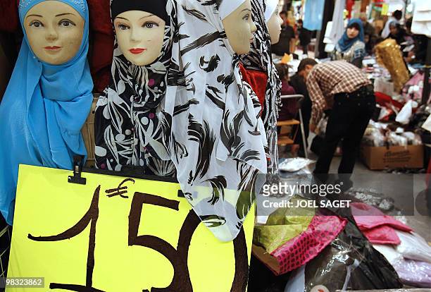Veils are displayed on a women fashion stall of the annual meeting of French Muslims organized by the Union of Islamic Organisations of France in Le...