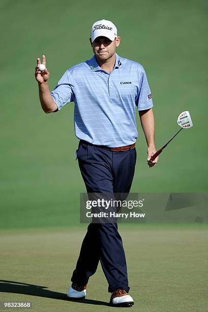 Bill Haas waves to the gallery on the second green during the first round of the 2010 Masters Tournament at Augusta National Golf Club on April 8,...