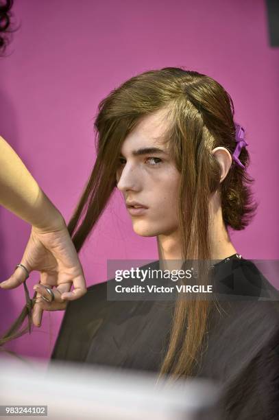 Model backstage during the Juun J Menswear Spring/Summer 2019 fashion show as part of Paris Fashion Week on June 22, 2018 in Paris, France.