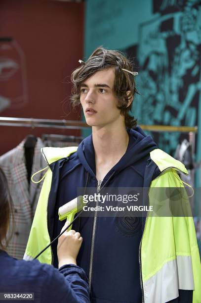 Model backstage during the Juun J Menswear Spring/Summer 2019 fashion show as part of Paris Fashion Week on June 22, 2018 in Paris, France.