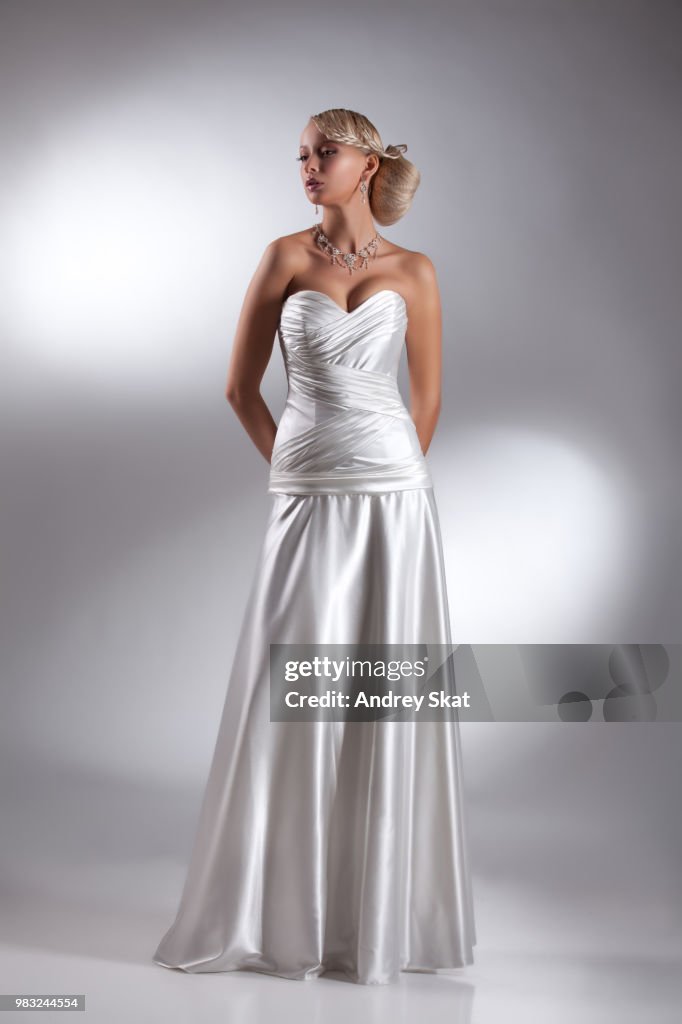 Young Beautiful Woman In A Wedding Dress