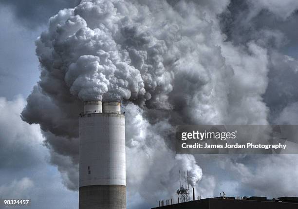 up in smoke - chimney stock-fotos und bilder