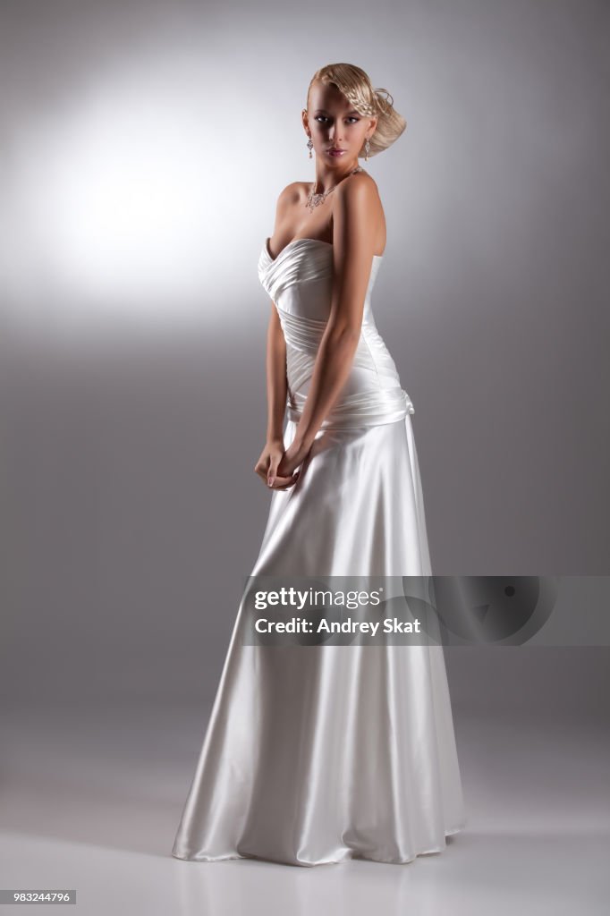 Young Beautiful Woman In A Wedding Dress