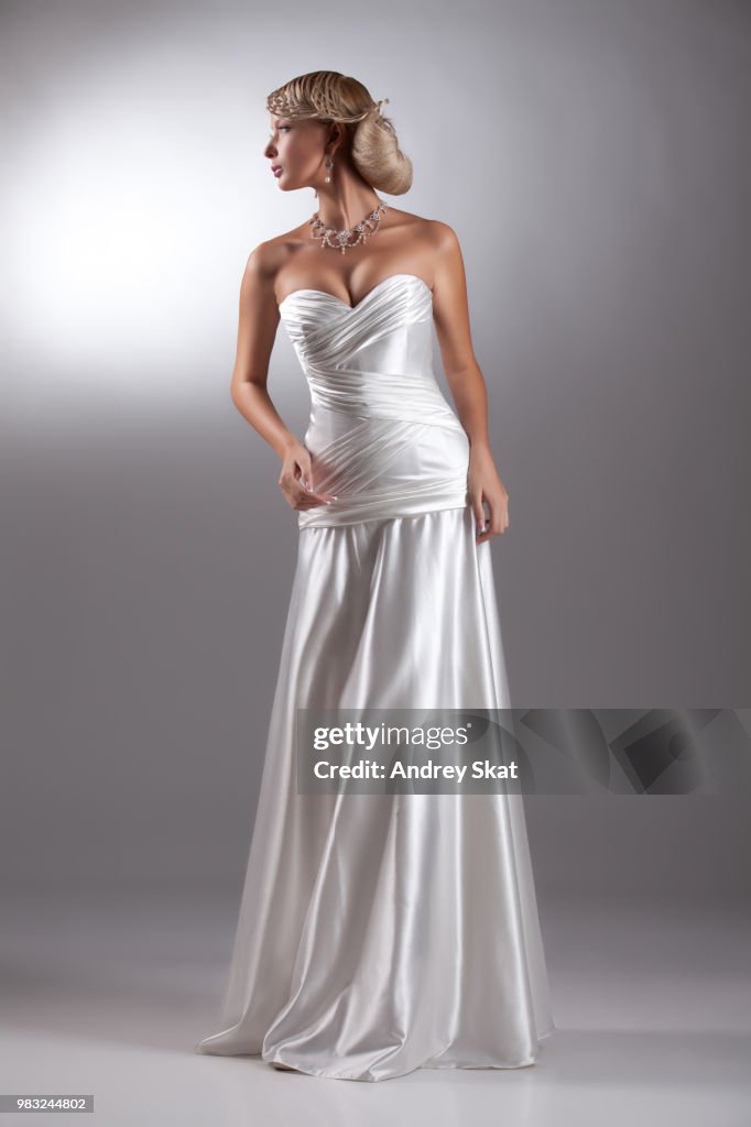 Young Beautiful Woman In A Wedding Dress