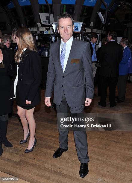 Actor Bryan Cranston poses for pictures on the trading floor after ringing the opening bell at the New York Stock Exchange on April 8, 2010 in New...