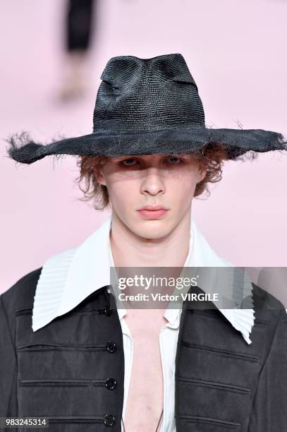 Model walks the runway during the Ann Demeulemeester Menswear Spring/Summer 2019 fashion show as part of Paris Fashion Week on June 22, 2018 in...