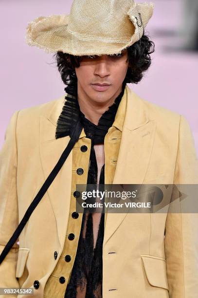 Model walks the runway during the Ann Demeulemeester Menswear Spring/Summer 2019 fashion show as part of Paris Fashion Week on June 22, 2018 in...