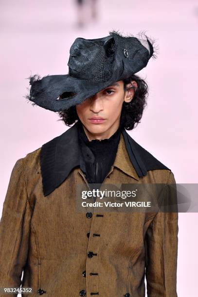 Model walks the runway during the Ann Demeulemeester Menswear Spring/Summer 2019 fashion show as part of Paris Fashion Week on June 22, 2018 in...