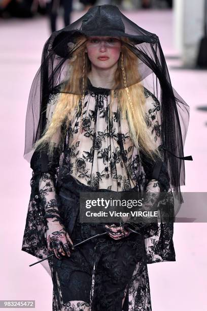 Model walks the runway during the Ann Demeulemeester Menswear Spring/Summer 2019 fashion show as part of Paris Fashion Week on June 22, 2018 in...