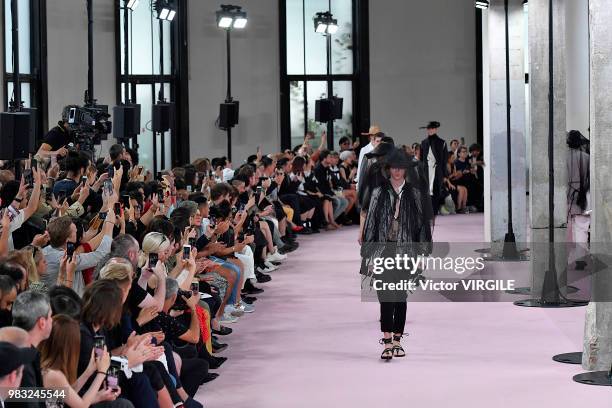 Model walks the runway during the Ann Demeulemeester Menswear Spring/Summer 2019 fashion show as part of Paris Fashion Week on June 22, 2018 in...