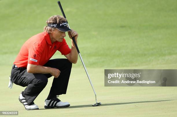 Bernhard Langer of Germany lines up a putt on the eighth hole during the first round of the 2010 Masters Tournament at Augusta National Golf Club on...