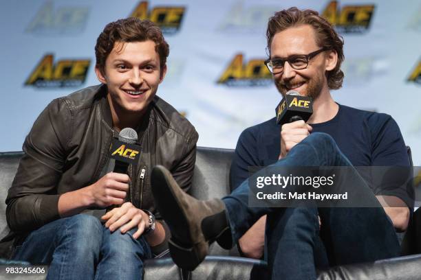 Tom Holland and Tom Hiddleston speak on stage during ACE Comic Con at WaMu Theatre on June 24, 2018 in Seattle, Washington.