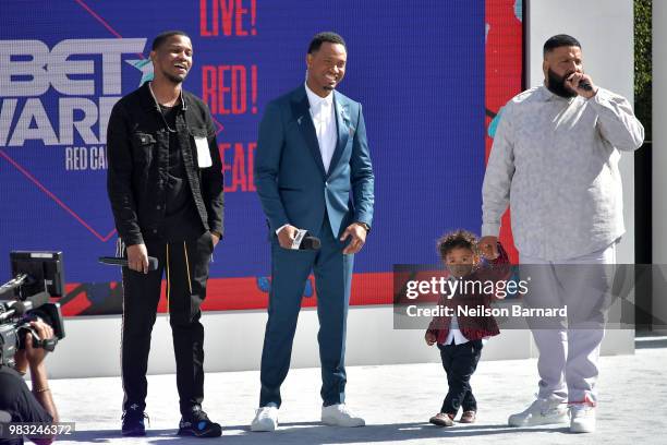 Nick Grant, co-host Terrence J, Asahd Tuck Khaled, and DJ Khaled speak onstage at Live! Red! Ready! Pre-Show, sponsored by Nissan, at the 2018 BET...