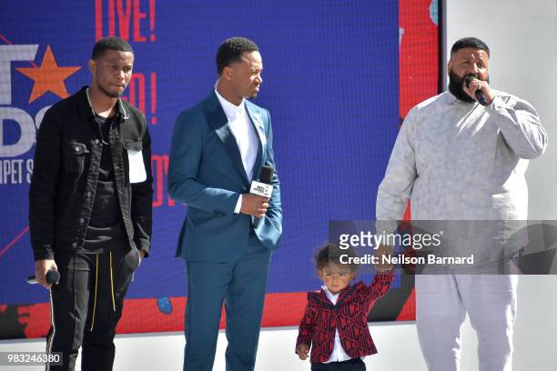 Nick Grant, co-host Terrence J, Asahd Tuck Khaled, and DJ Khaled speak onstage at Live! Red! Ready! Pre-Show, sponsored by Nissan, at the 2018 BET...