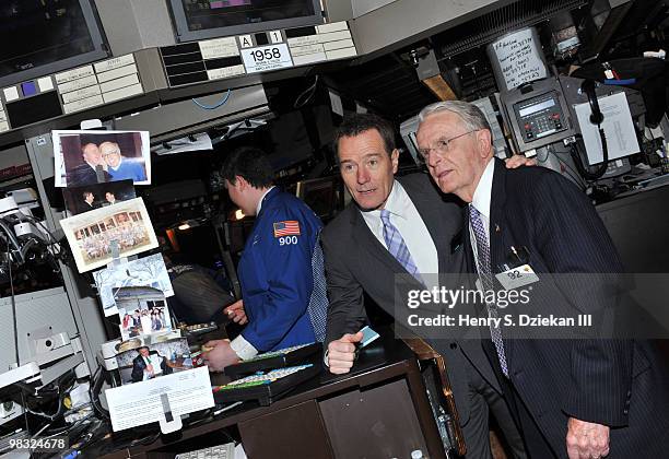 Actor Bryan Cranston poses for pictures on the trading floor before ringing the opening bell at the New York Stock Exchange on April 8, 2010 in New...