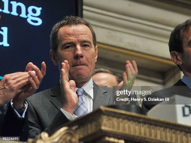 Actor Bryan Cranston rings the opening bell at the New York Stock Exchange on April 8, 2010 in New York City.