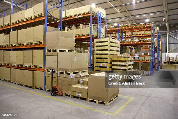 interior view of warehouse - newbusiness stock pictures, royalty-free photos & images